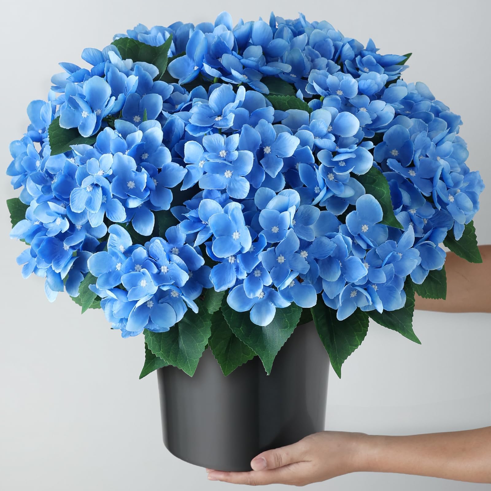 FOTEEWL silk flower heads and leaves resist weather for maintenance-free beauty.