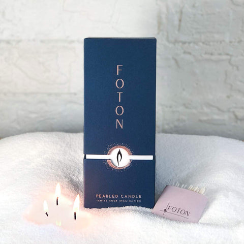 Foton Pearled Candle pearls in a container for customizable designs.
