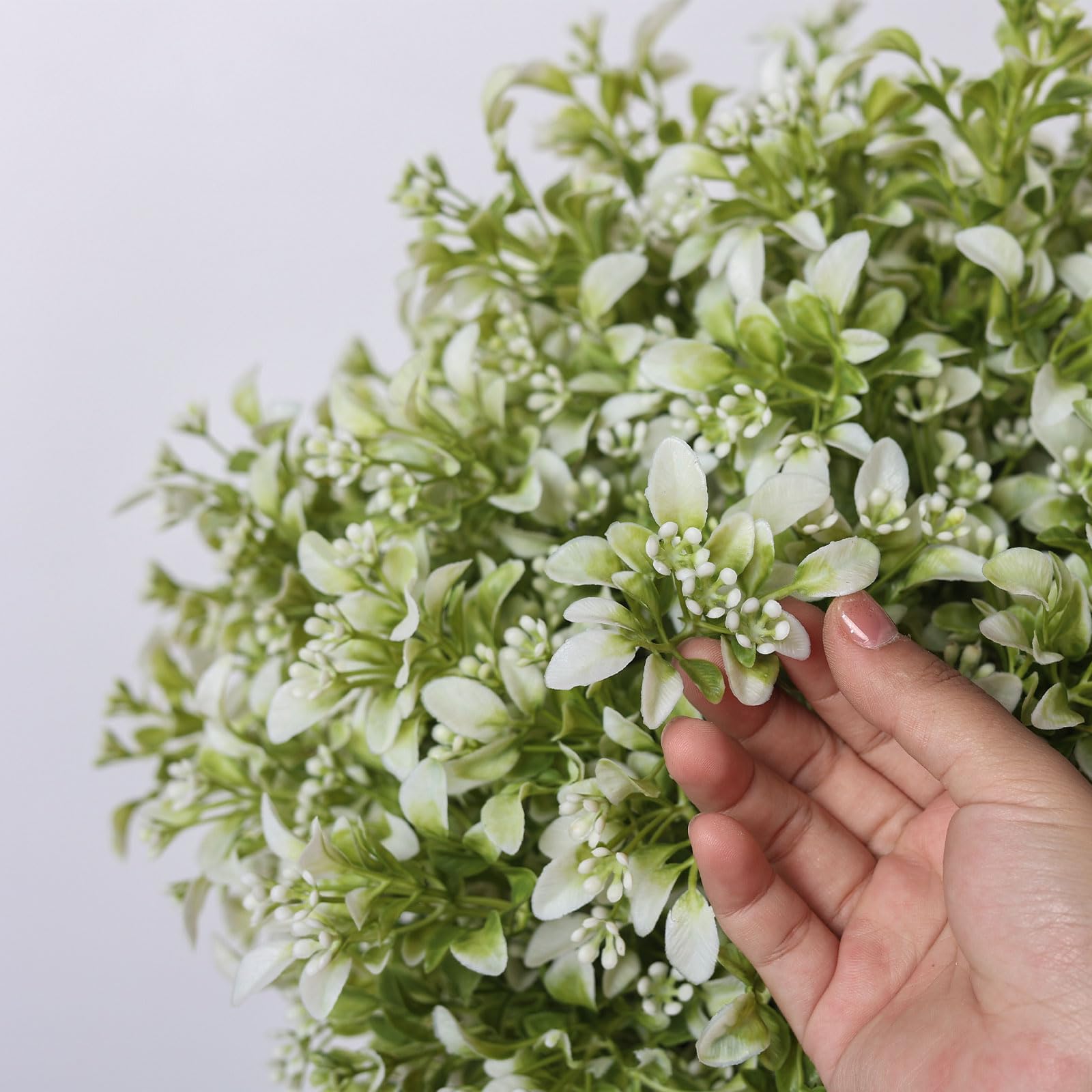 FOTEEWL simply unpack and position topiary; quick decorating without tools.