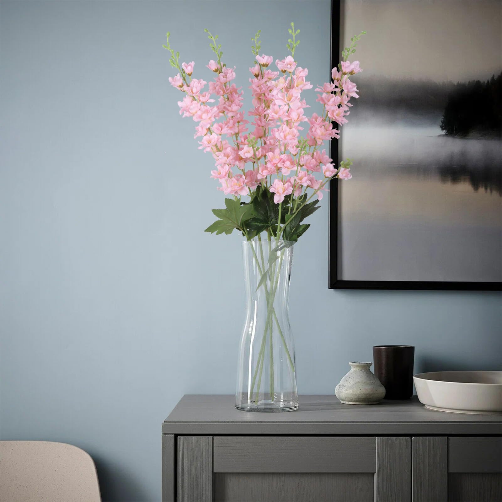 Fqueelvys wedding centerpiece with delphinium creates elegant focal point.
