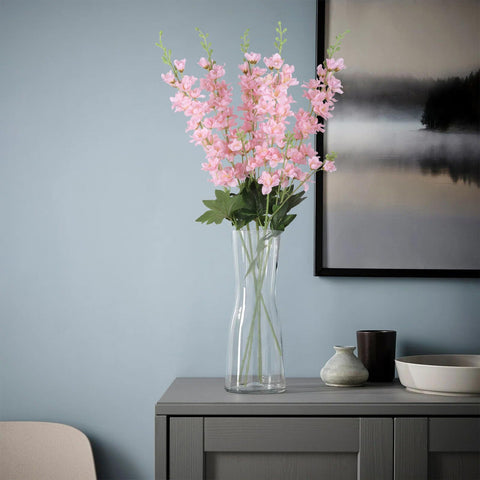 Fqueelvys wedding centerpiece with delphinium creates elegant focal point.