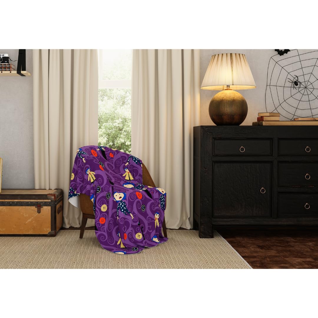 Franco Coraline throw on couch creates a cozy reading corner
