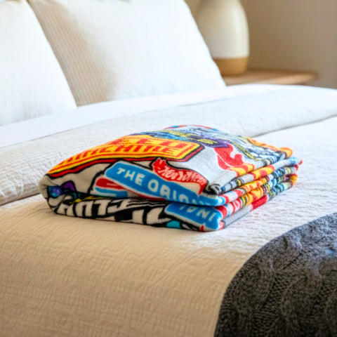 Franco Hot Wheels throw folded for travel, lightweight and portable