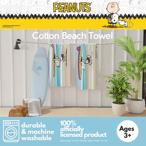 Franco Snoopy beach towel with vibrant scene highlights soft cotton for skin.