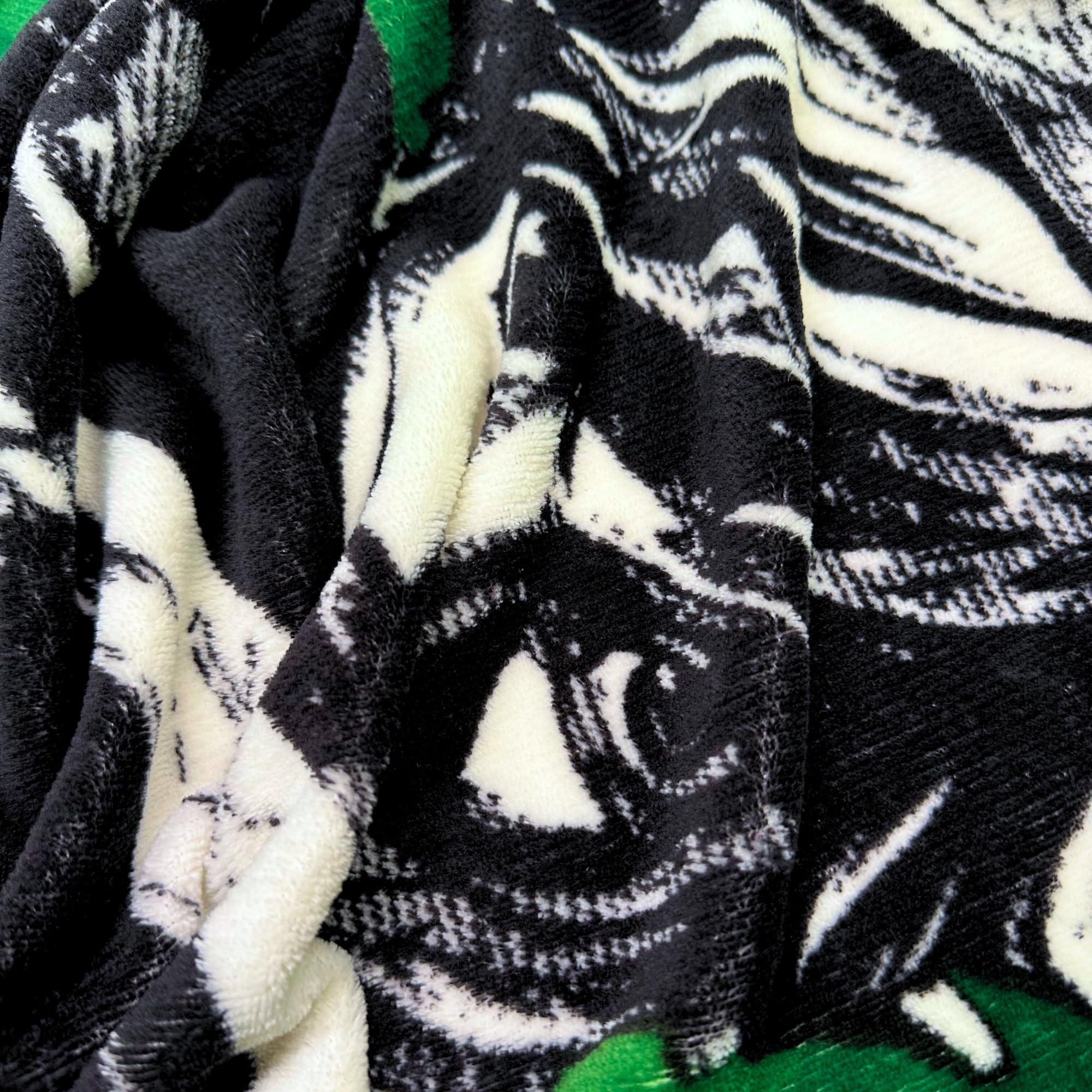 Franco Zelda Link throw provides lightweight warmth for camping trips or travel.