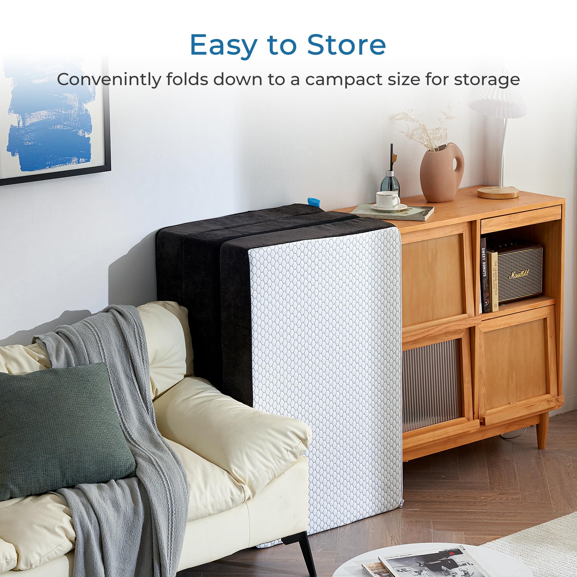 Freesof folded mattress stored neatly under a bed for space-saving storage.