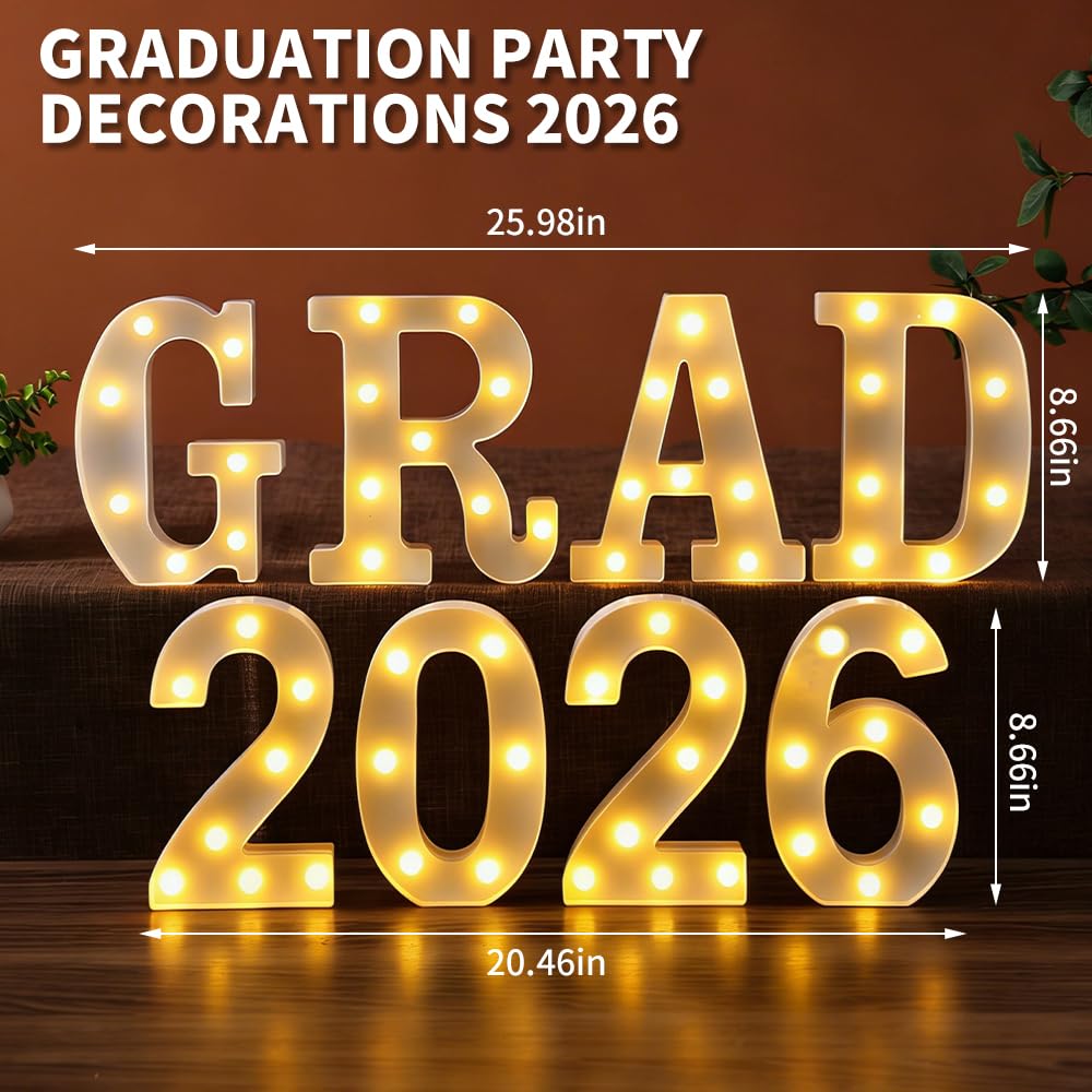 Frekkoy grad-2026 LED sign on table enhances photo opportunities.
