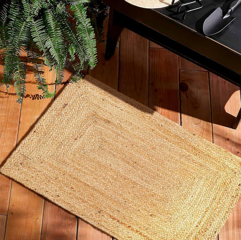 Natural yarn jute rug with braided texture by FRELISH DECOR for living rooms
