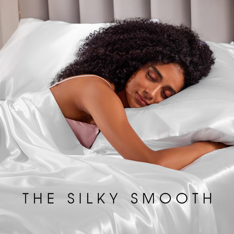 FreshCulture bedroom setup with white satin sheets for a chic look.