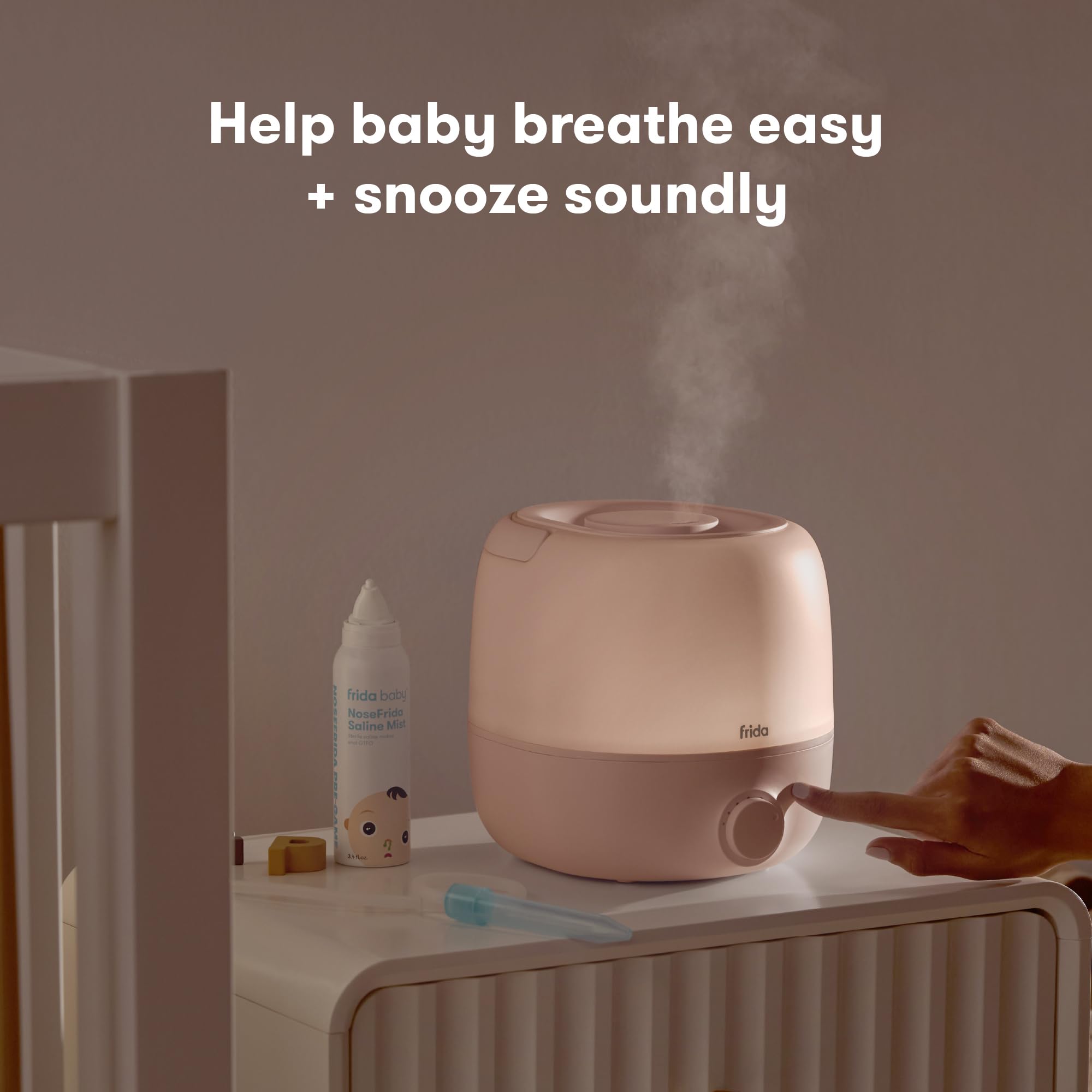 Frida Baby 3-in-1 humidifier nightlight provides a soft bedtime glow.