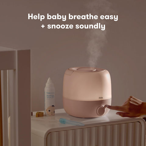 Frida Baby 3-in-1 humidifier nightlight provides a soft bedtime glow.