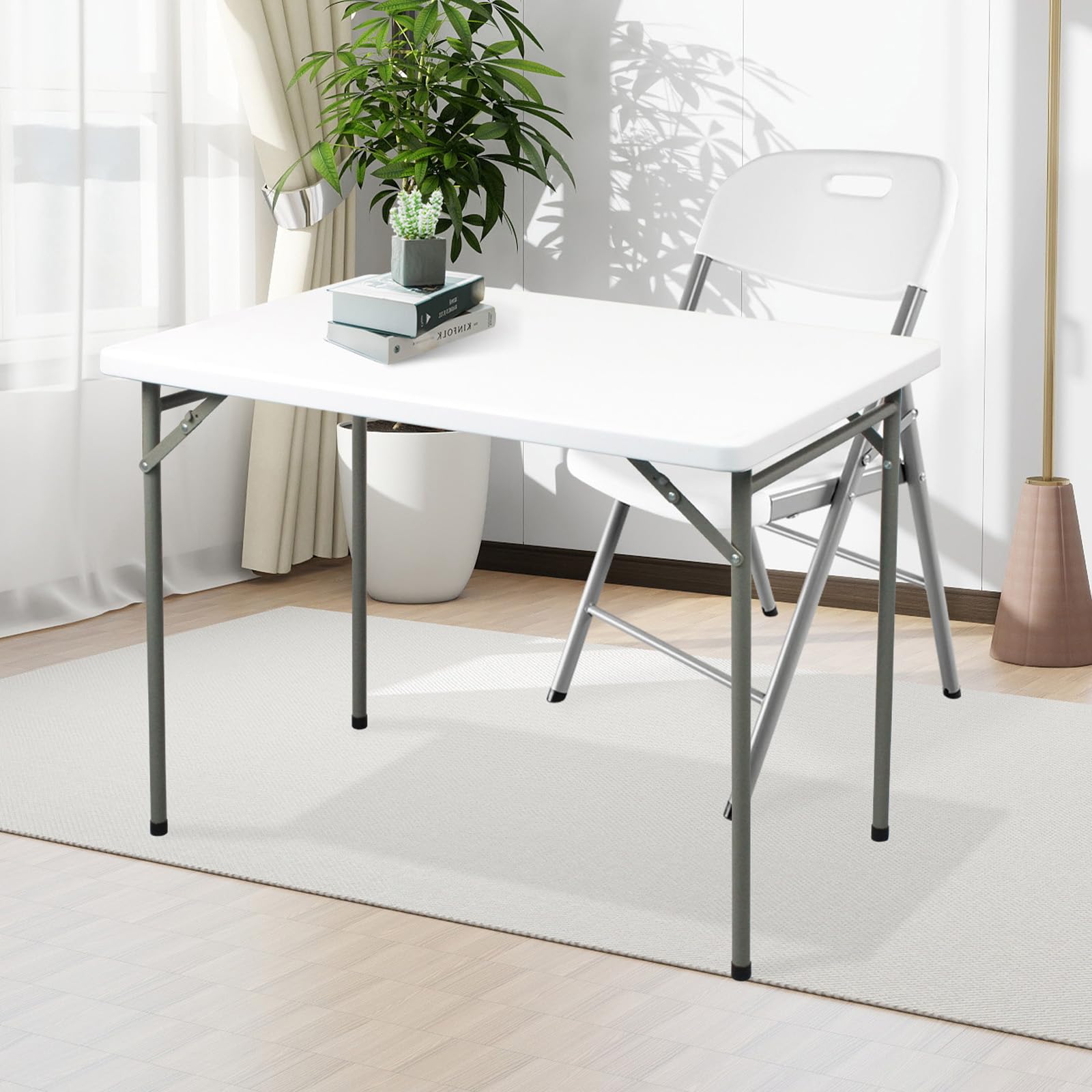 FROASISPRO folding table 3ft folded compact demonstrates portable storage and easy transport.
