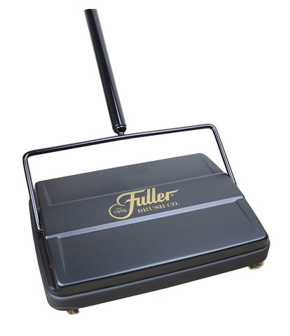 Fuller Brush 17027 sweeper clears crumbs on hardwood efficiently.