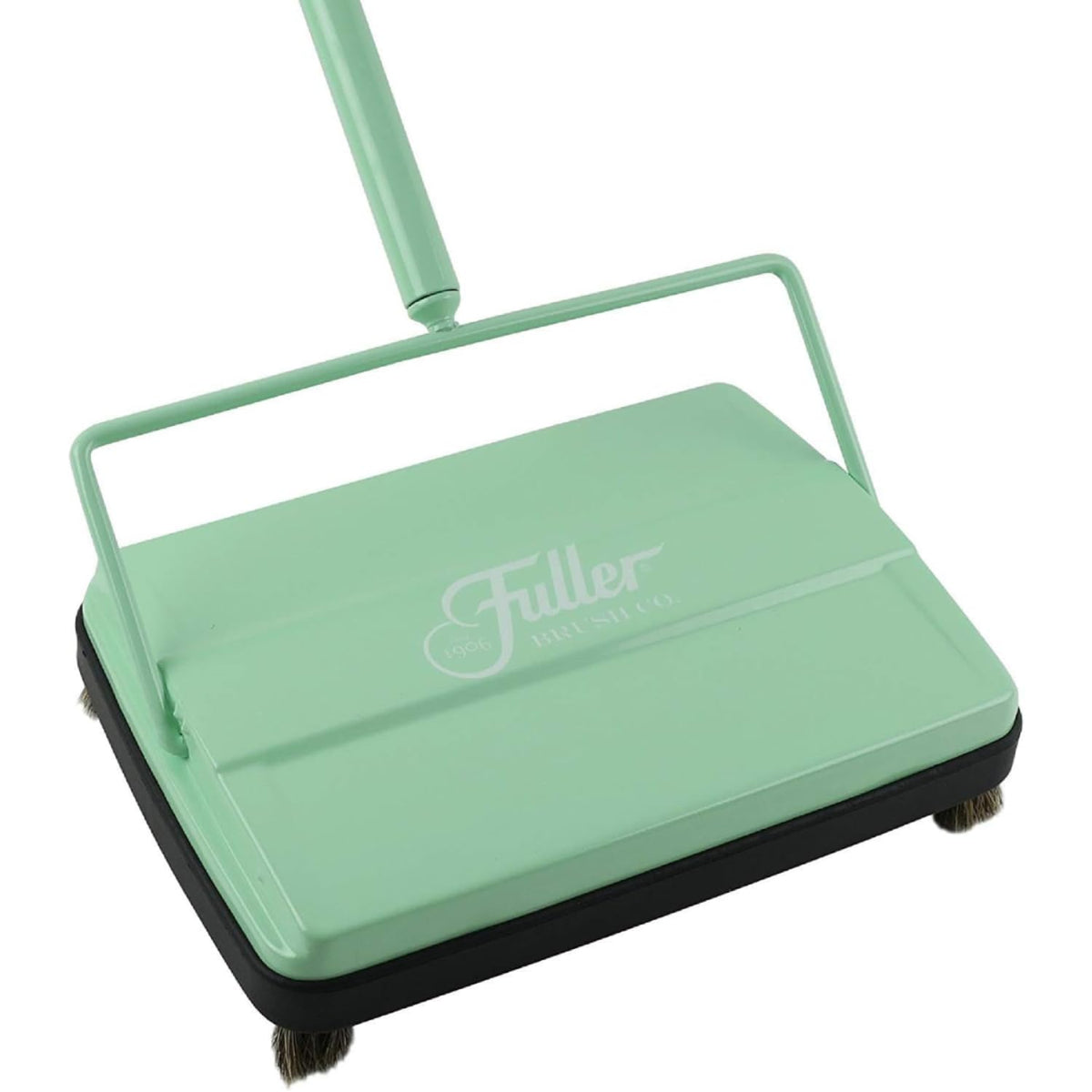 Fuller Brush 17029 sweeper in action, attracting dirt on hard floors.