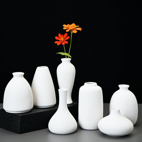 Fulloog bud vase set showcases nine shapes for versatile decor accents.