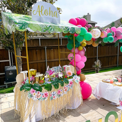Dessert table display using the Fun Express gold tent base for polished party setups