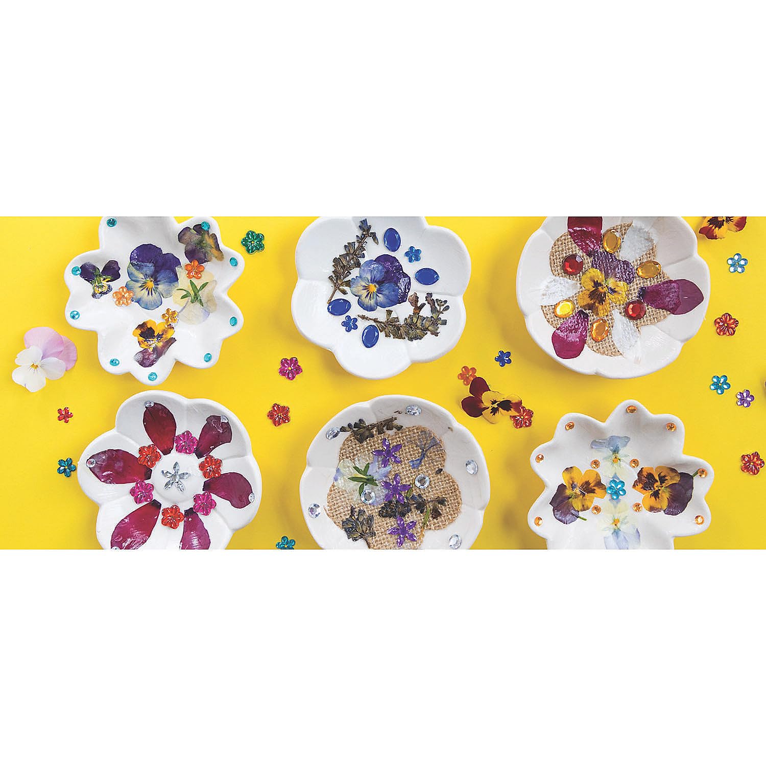 Fun Express paintable bisque bowls with flower design B, classroom-friendly.