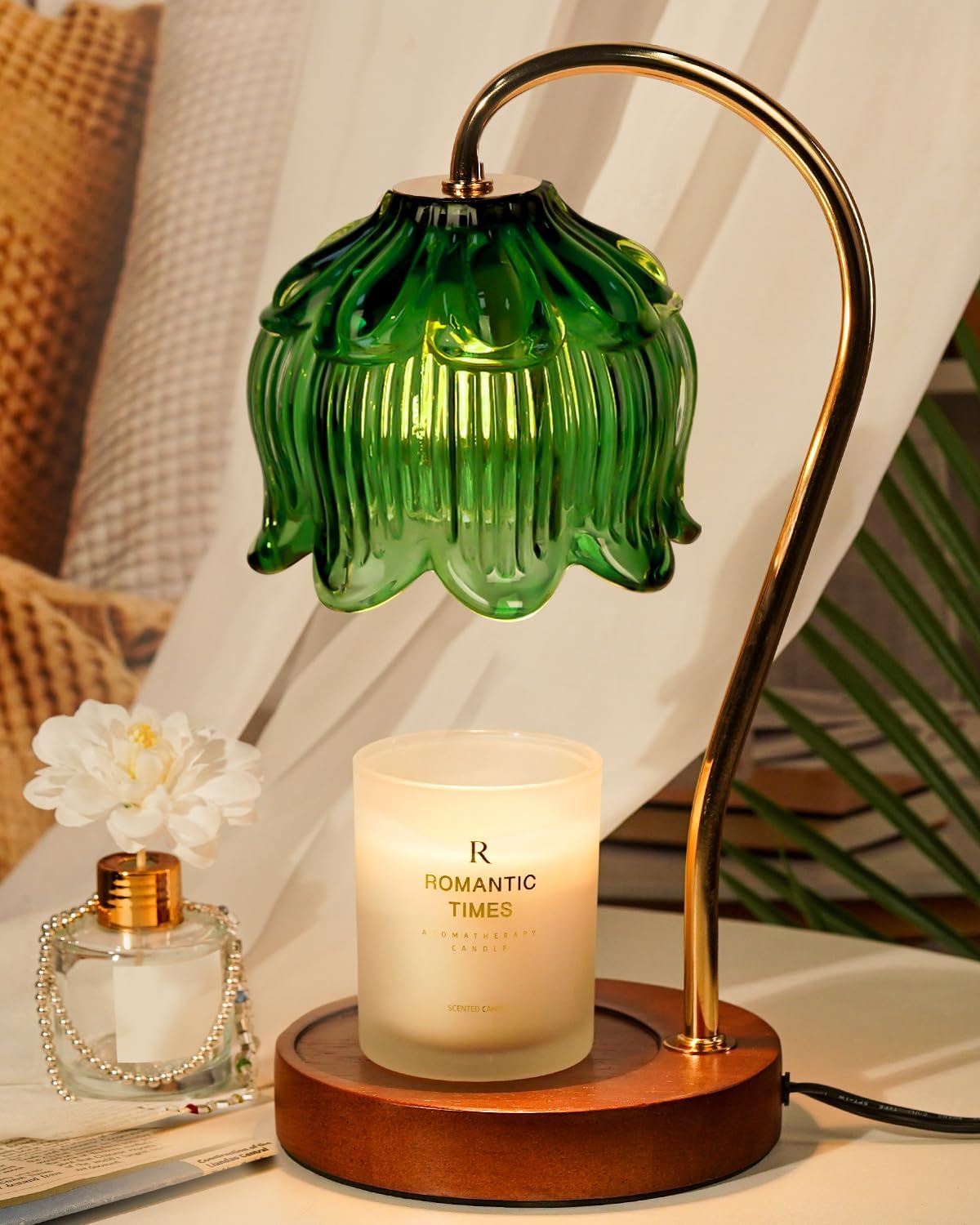 Funistree green candle warmer lamp with timer glows softly for cozy evenings.