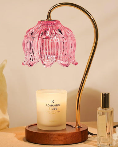 Funistree pink candle warmer lamp with lotus shade provides flameless fragrance.