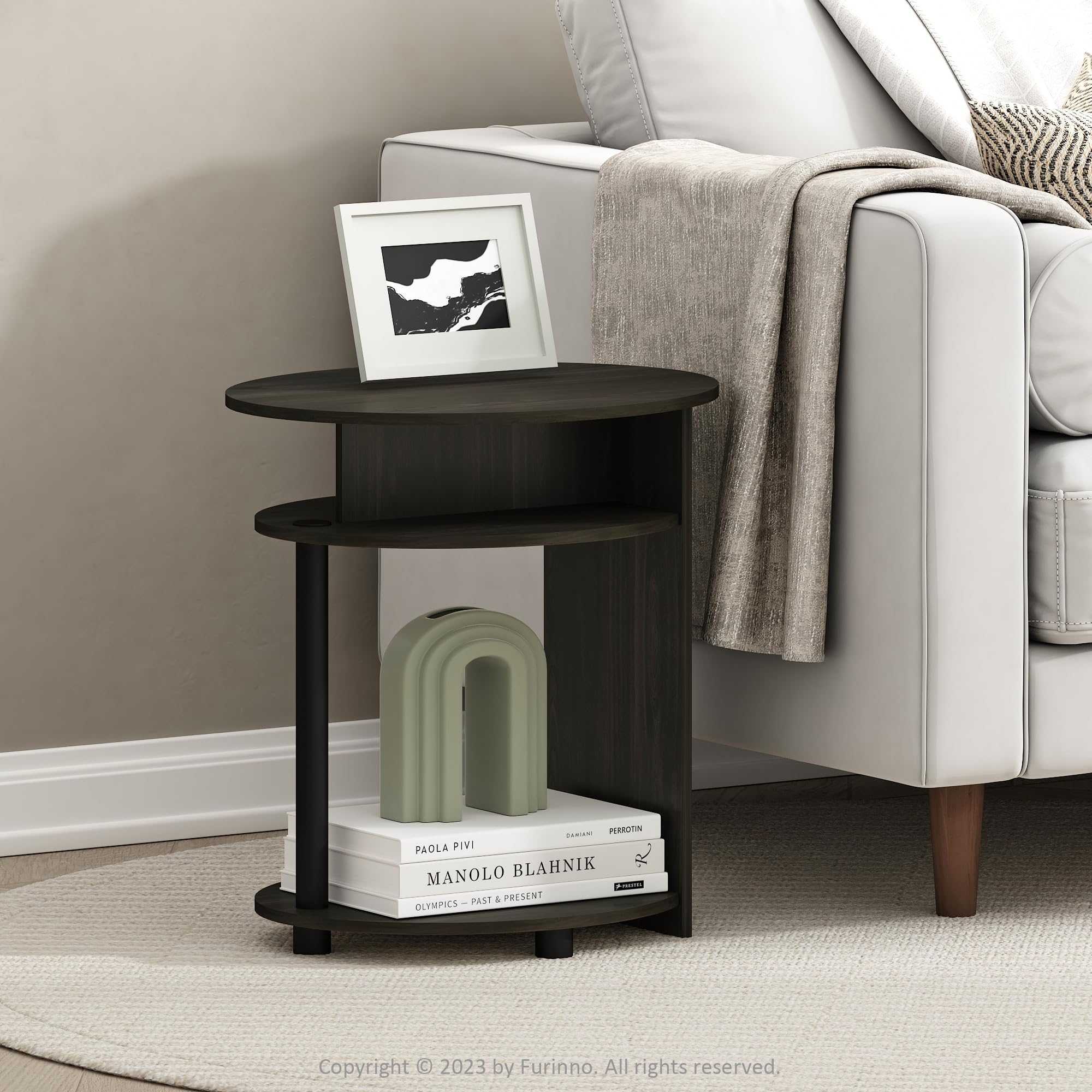FURINNO oval end table three open tiers keeps remotes and books organized.