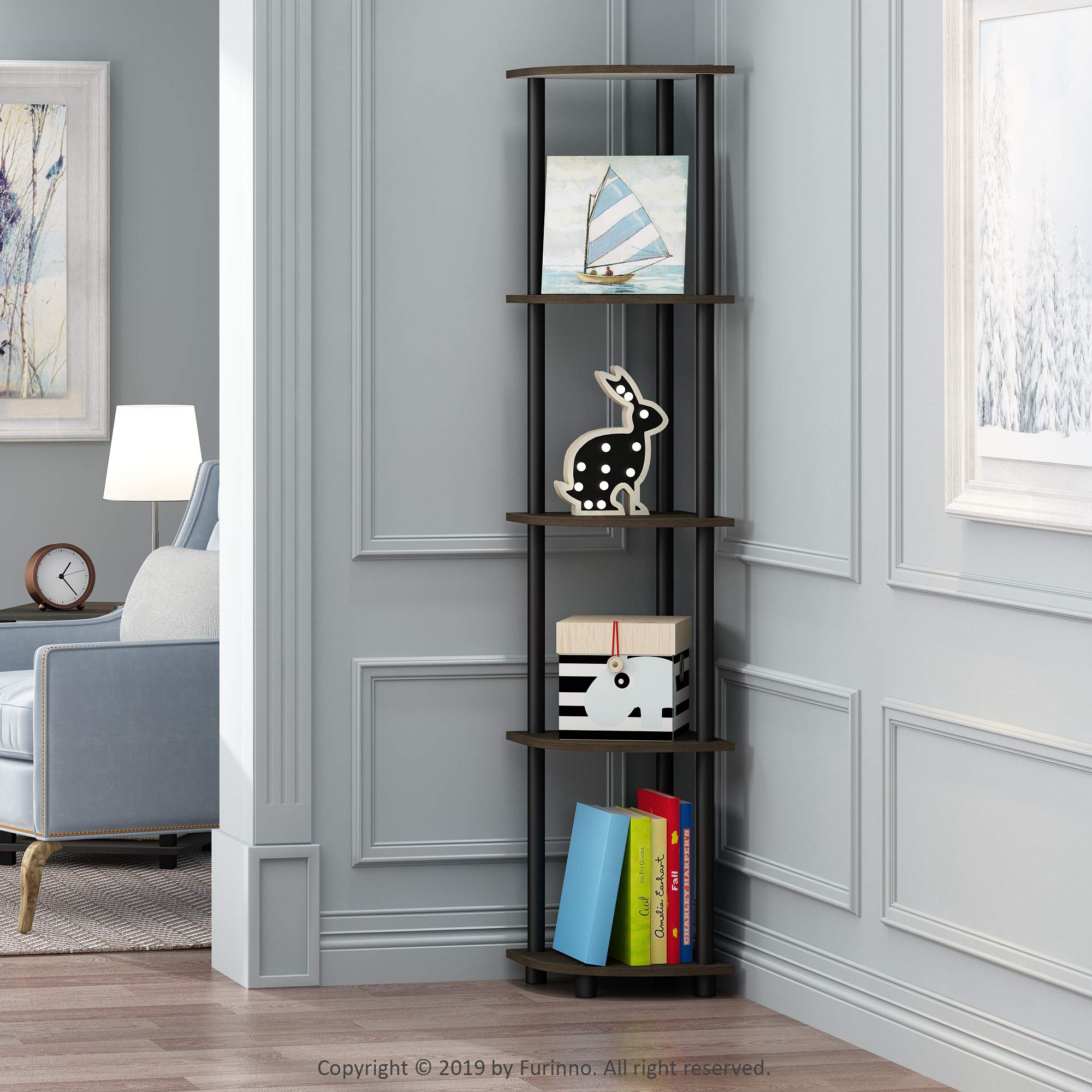 Five-tier shelf displays books and decor neatly on display.