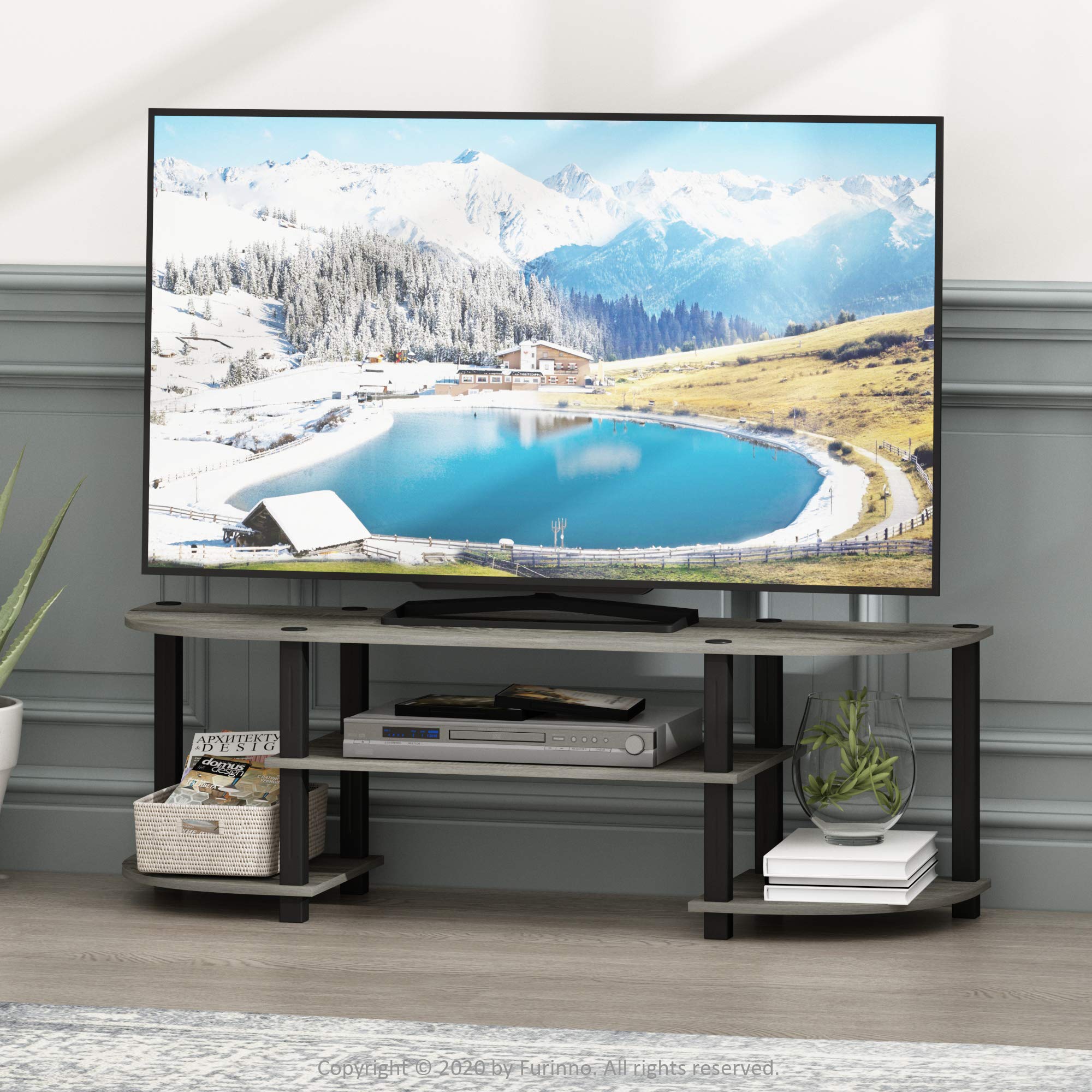 Furinno Turn-N-Tube TV Stand with three-tier storage for consoles and devices.