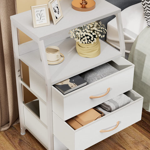 Fabric drawers on the Furnulem nightstand keep clothes and toys neatly stored