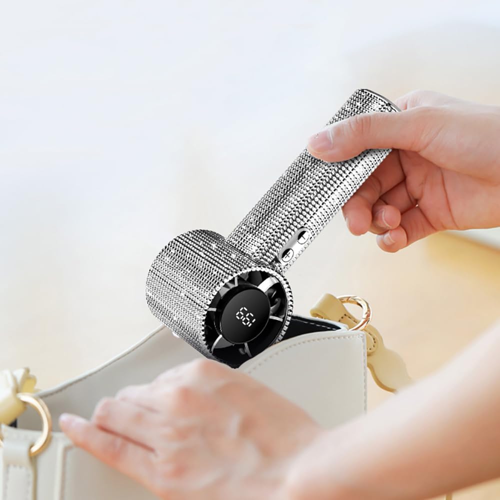 Fussybussy lightweight compact fan with ultra-long battery life for travel.