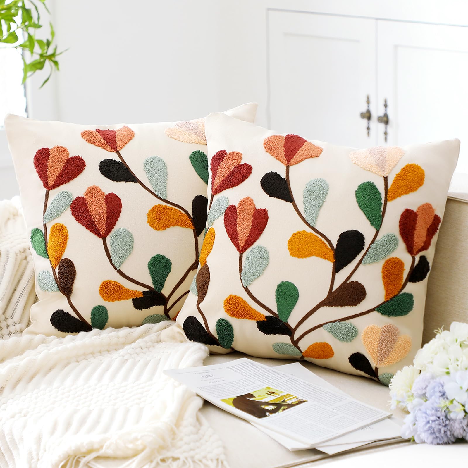 FuWeave boho floral embroidered pillow cover 18x18 adds vibrant texture to your sofa for bold styling.