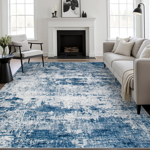 FXRHLP 6x9 abstract blue rug in a living room adds warm style.