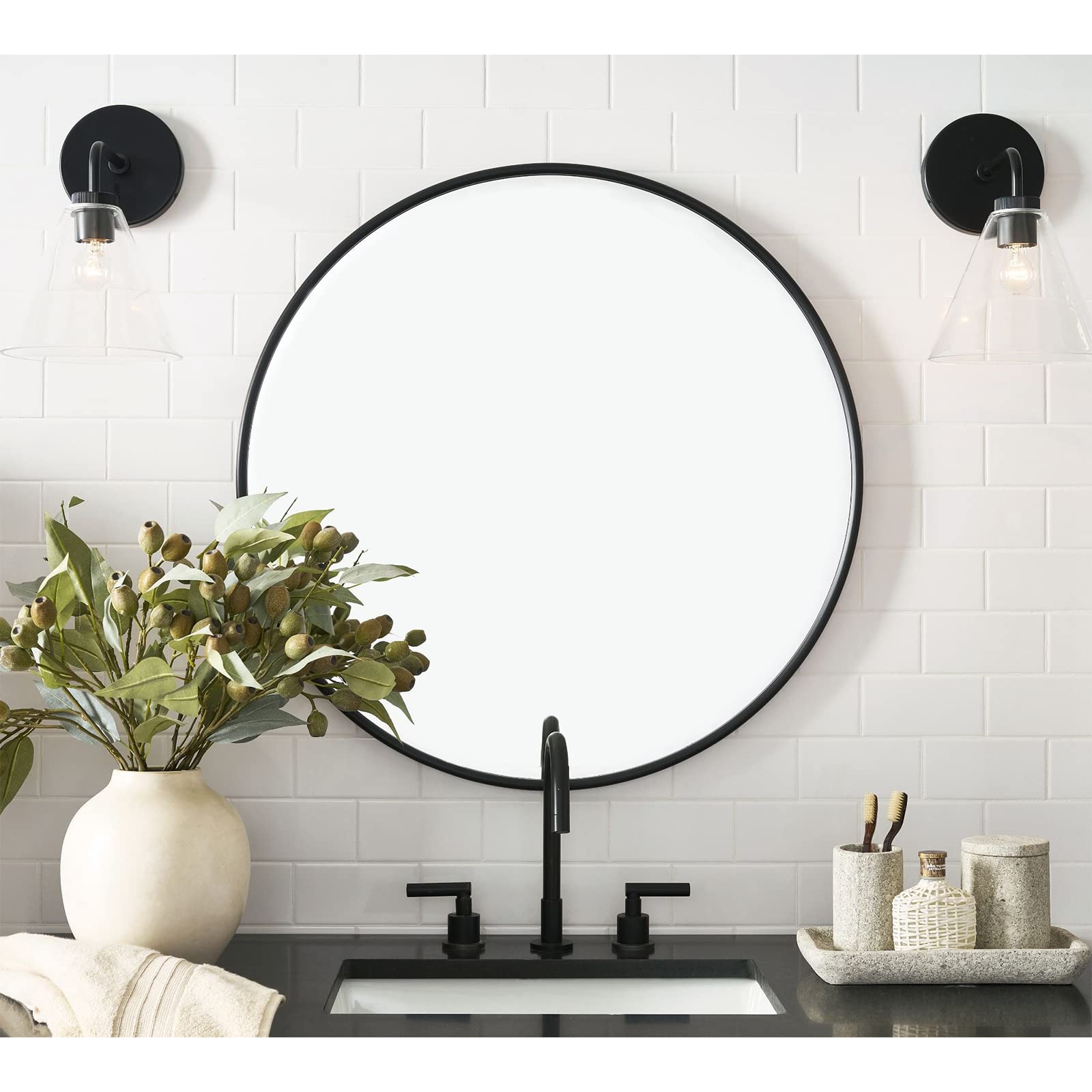 G-LEAF round mirror edge detail showing a seamless overlay frame for easy cleaning.