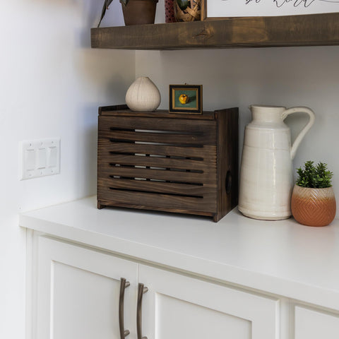 Gadget Garage wifi cabinet demonstrates integrated cable management for tidy setups.