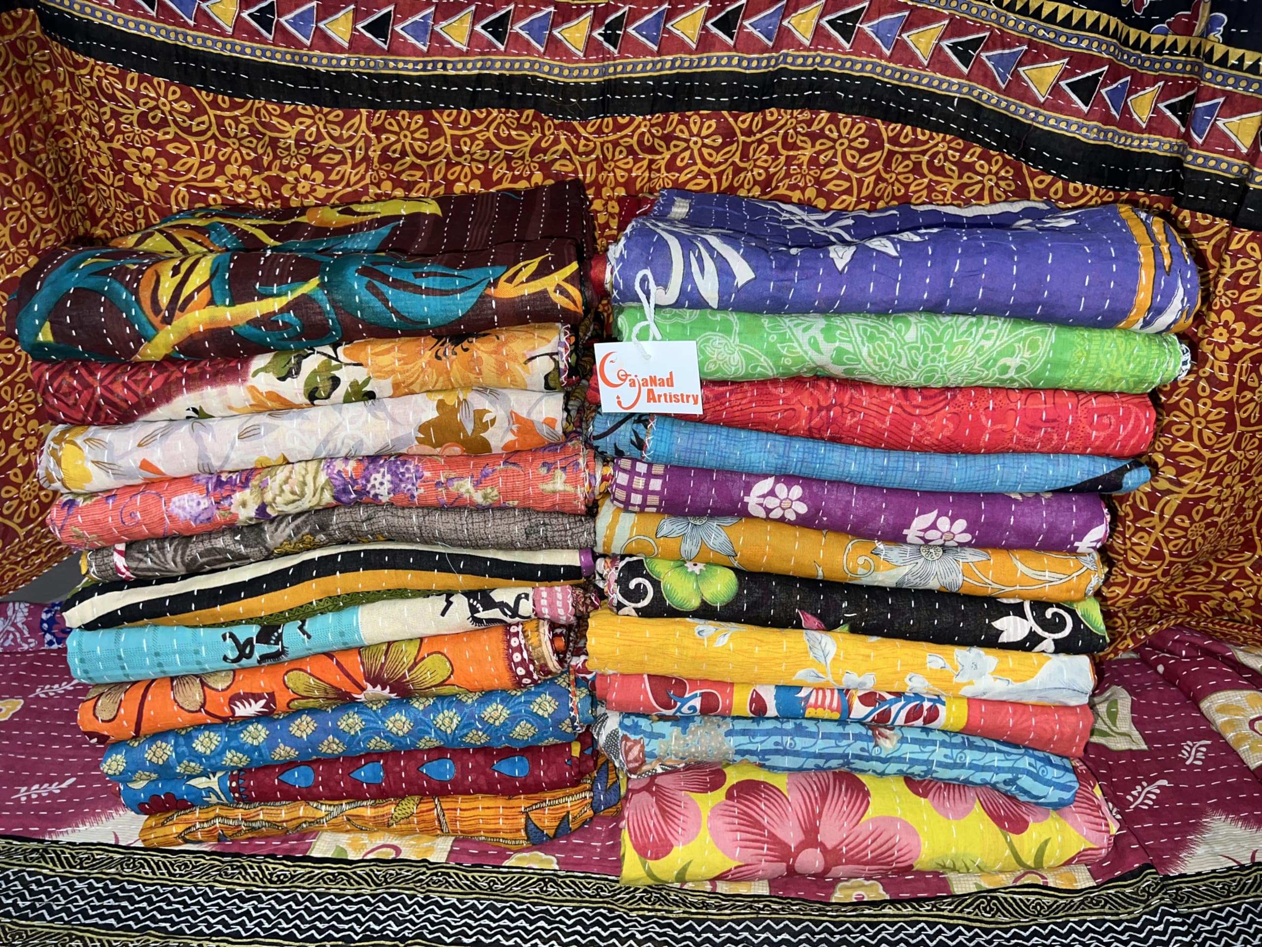 Gajanad Artistry 5-piece Kantha quilt set with vibrant colors adds cozy warmth to beds.