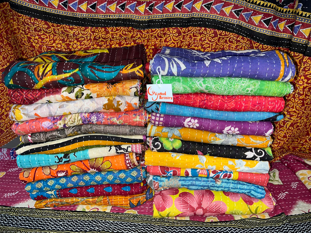 Gajanad Artistry 5-piece Kantha quilt set with vibrant colors adds cozy warmth to beds.