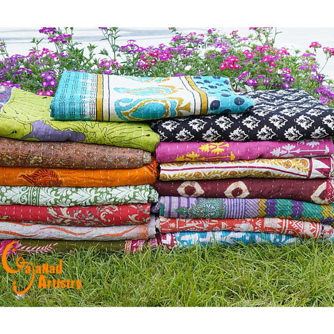 Gajanad Artistry Kantha quilt reversible colors provide versatile decor for any room.