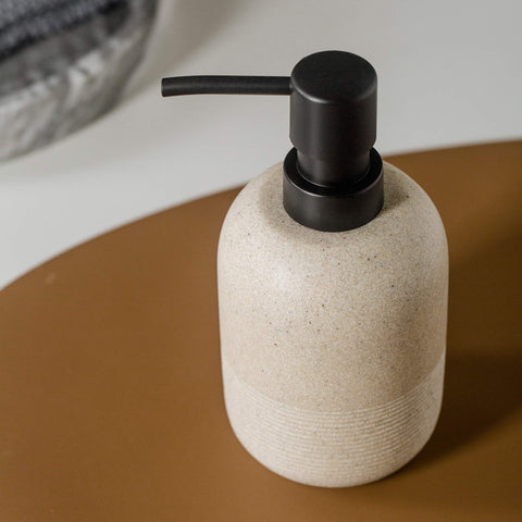 GalDal countertop dispenser showing 10.6oz capacity for easy refills.