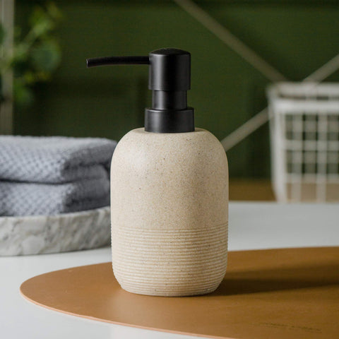 GalDal sturdy beige dispenser with a solid, weighty feel.