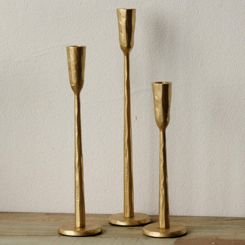 Ganwu Gold iron taper candle holder with heavy base for stable display.