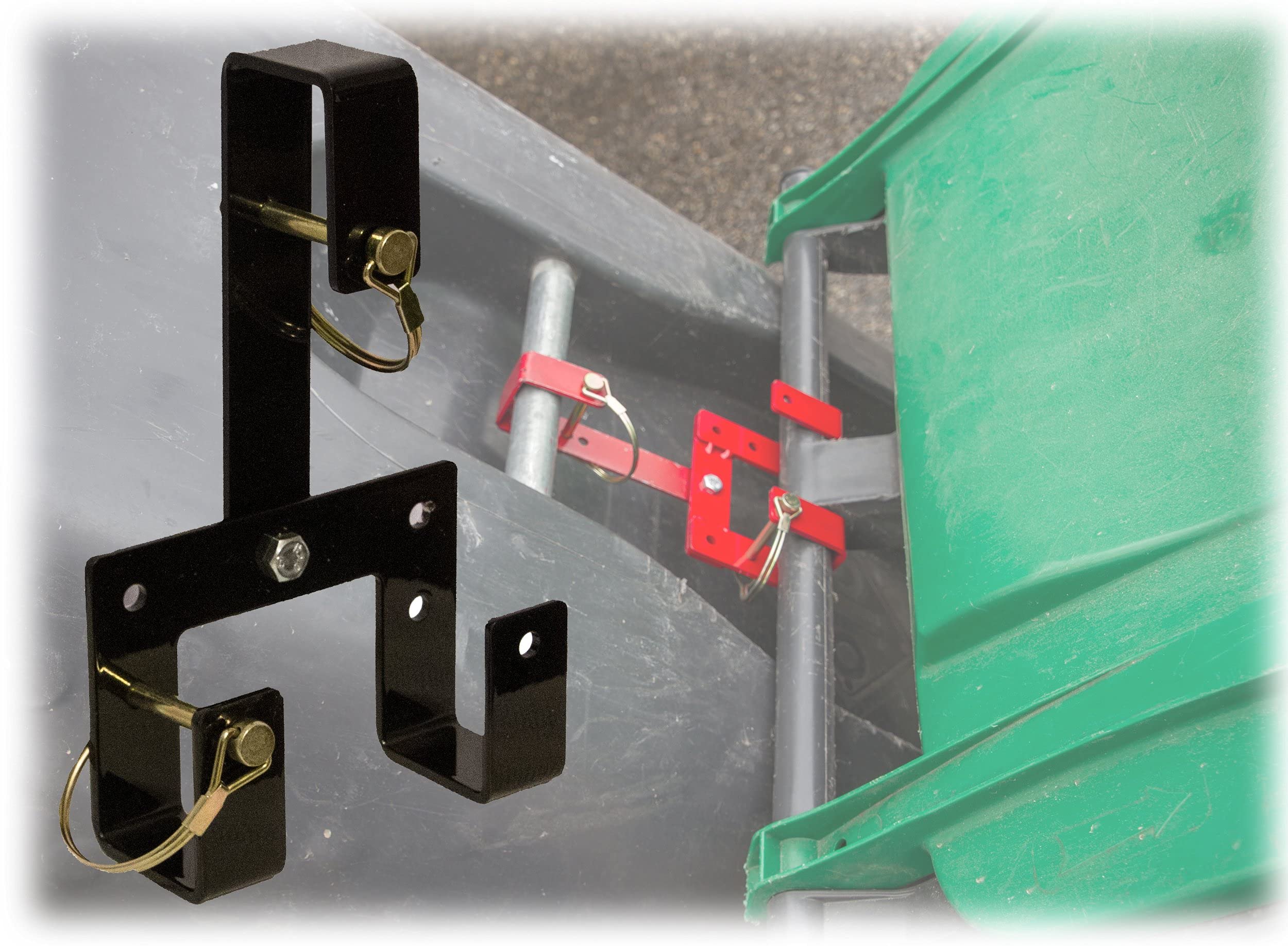 Garbage Commander hook system shown in action for multi-bin waste pickup.