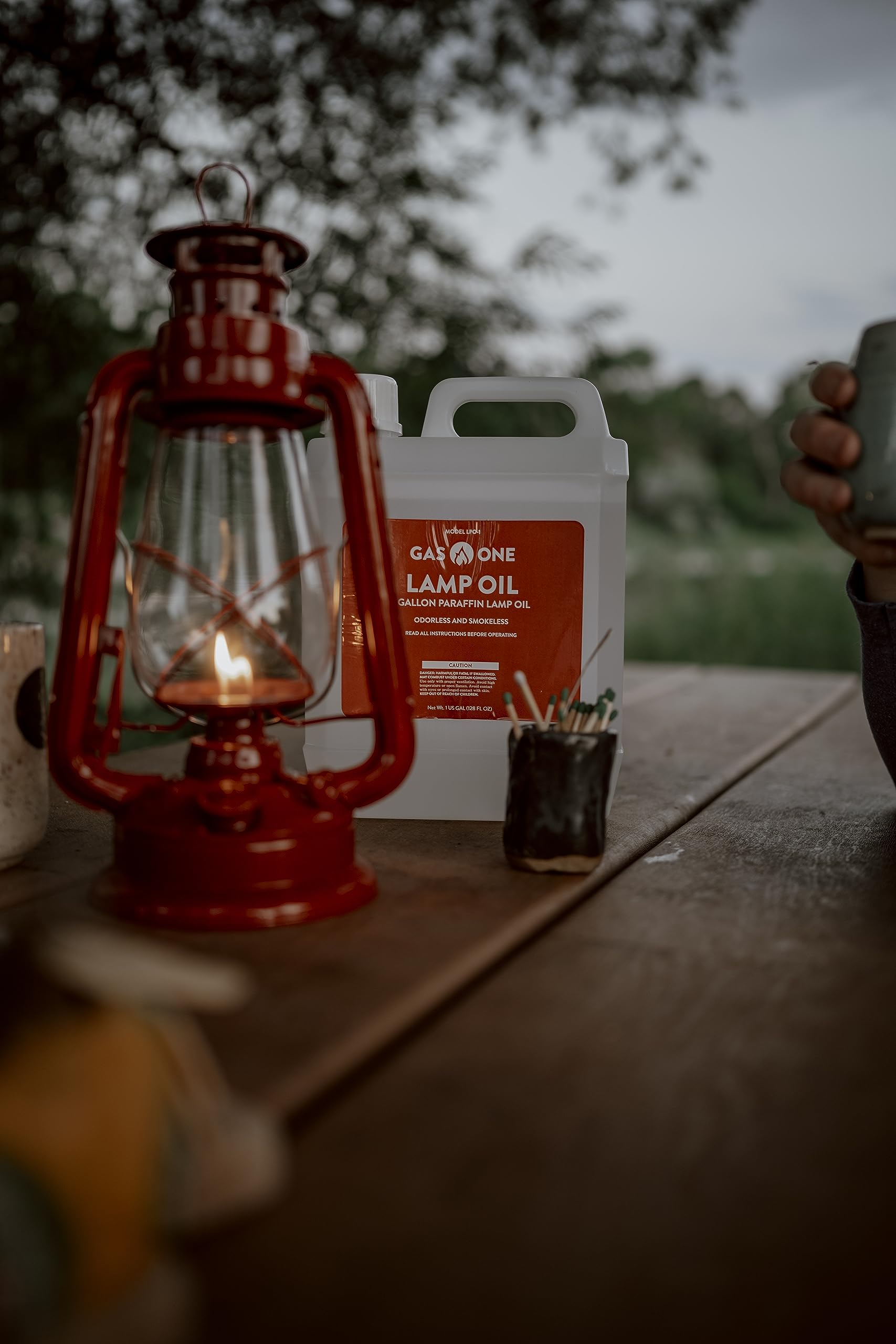 Gas One lamp oil enhances ambiance for candles and candlesticks.