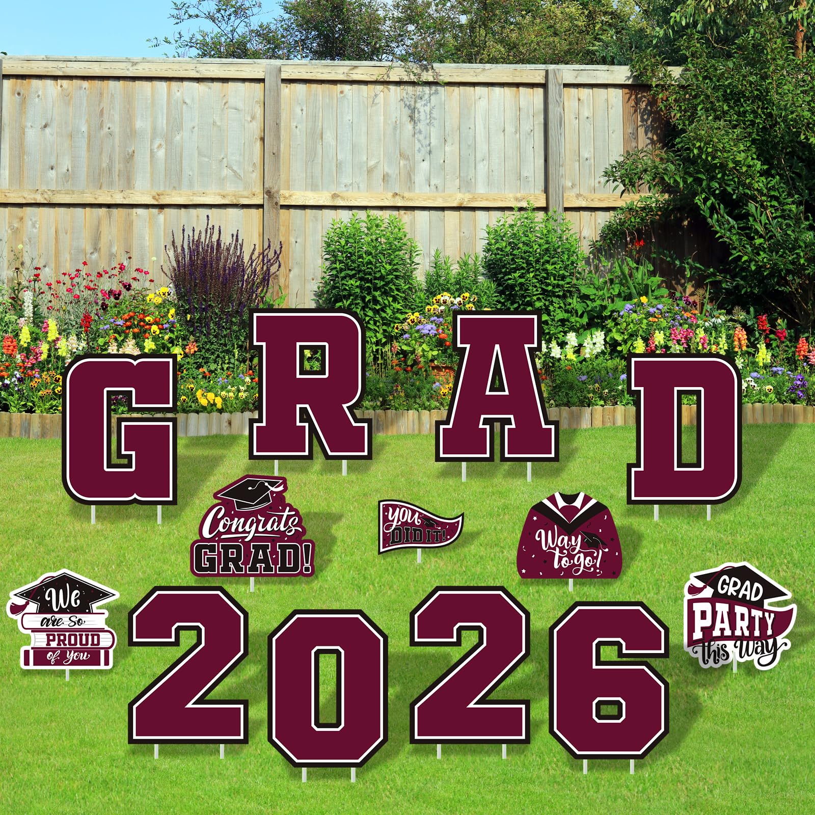 Gatherfun maroon graduation yard sign featuring a cap design for outdoor display
