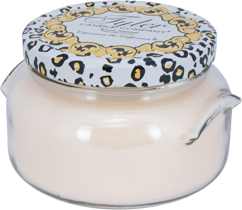 Generic Diva High Maintenance large-format candle on a living room table.