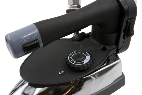Generic Gravity-Feed Steam Iron Silver Star ES-300 in-hand use supports precise garment finishing.