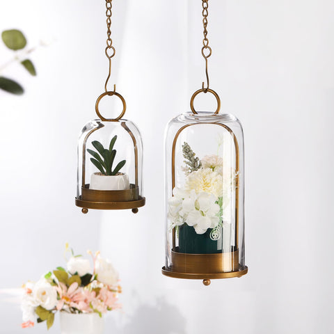 Generic brass holder suits pillar candles and small plants for versatile setups.