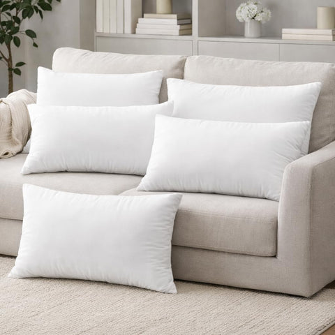 Generic soft-support lumbar insert shown in use on a living room chair.