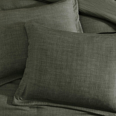 Geniospin dark-green bedding tone coordinates easily with décor.