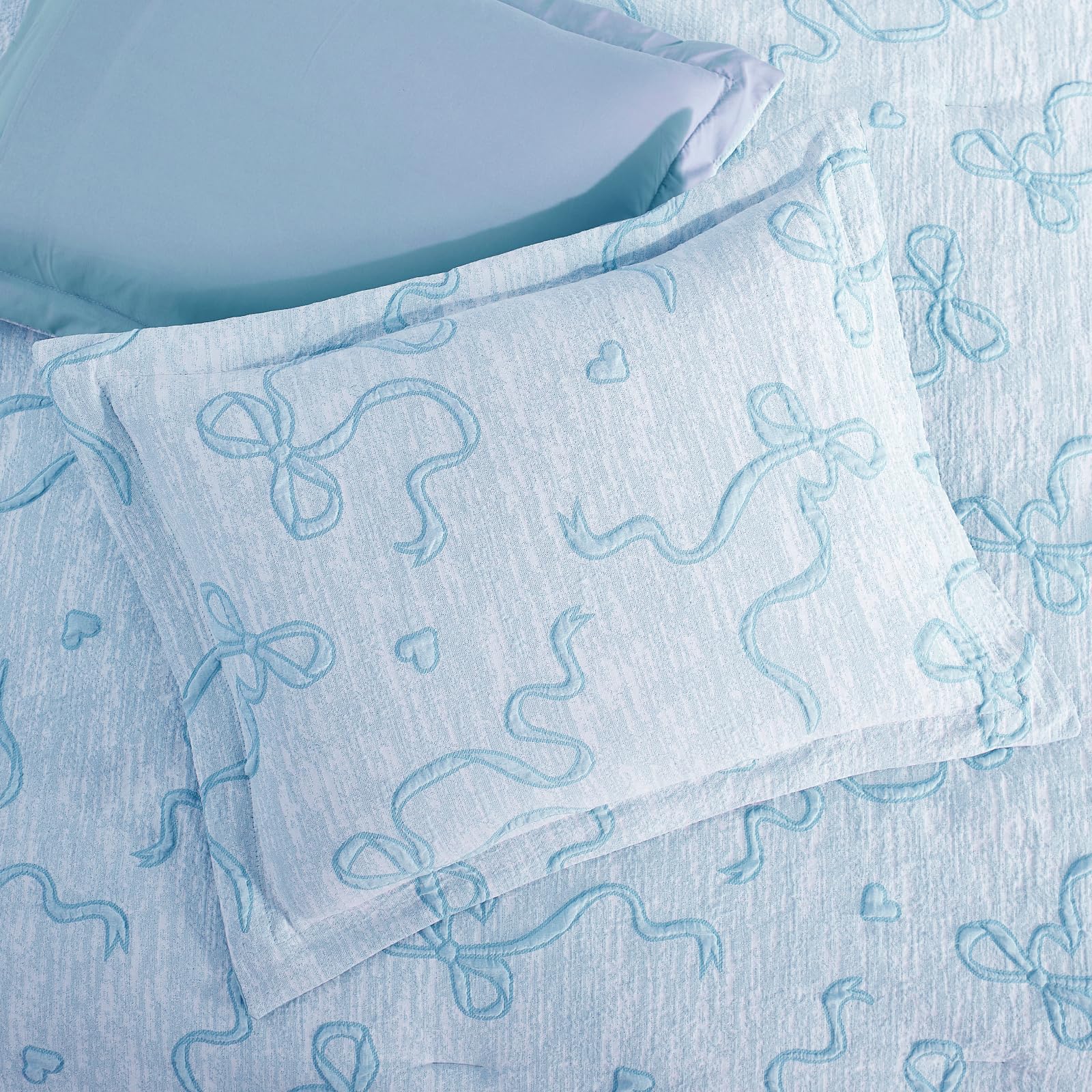 Geniospin light blue twin room setup shows versatile dorm or bedroom styling
