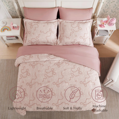 Geniospin pink bed-in-a-bag full set showcases complete seven-piece bedding for easy setup.