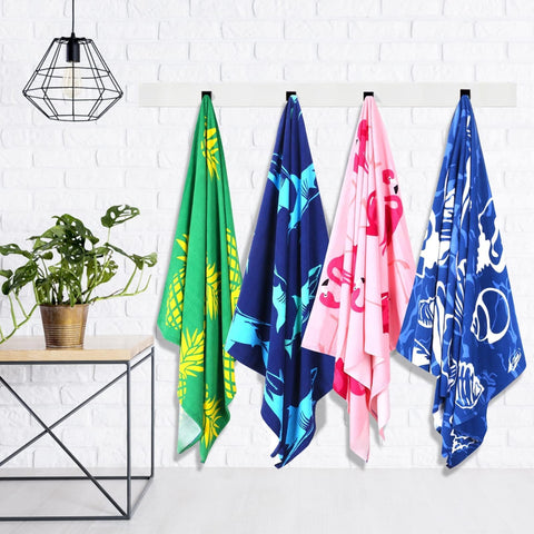 Genovega oversized towel laid out on a lounge chair.