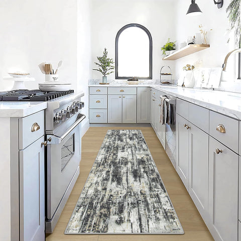 Gent drizz 2-6x8 runner with abstract pattern adds modern style to busy hallways.